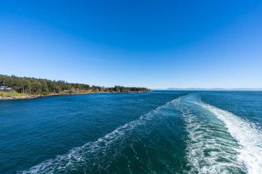 Ferry sailing on the ocean, Southern Gulf Islands, Strait of Georgia. clipart