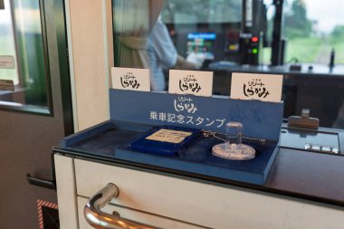 Akita Prefecture, Japan - August 7 2024 : Ride commemorative stamp located in the observation room and event space of Resort Shirakami 