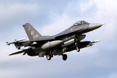 Aviano based US Air Force F-16C fighter jet of the 31st Fighter Wing arriving at Leeuwarden Air Base, The Netherlands - March 30, 2022 clipart