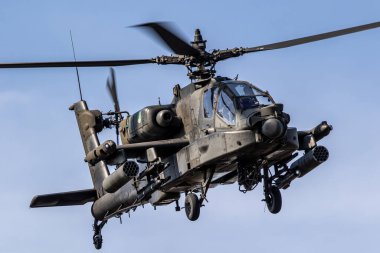Boeing AH-64D Apache Attack Helicopter in flight. Veluwe, The Netherlands - September 16, 2023 clipart