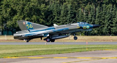 Former Swedish Air Force Saab 35 Draken fighter jet arriving at Kleine-Brogel Airbase. Peer, Belgium - Sep 8, 2023 clipart