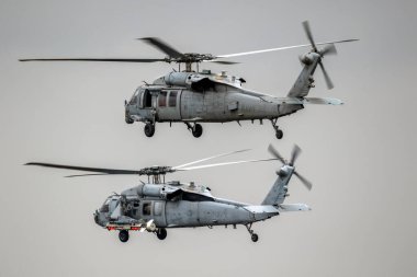 US Navy MH-60S Seahawks in flight during NATO exercise BALTOPS24. Jagel, Germany - June 7, 2024 clipart