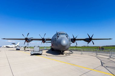 US Air Force C-130J-30 Hercules of the 37th AS from Ramstein air base at the International Aerospace Exhibition ILA Berlin, Germany - May 21, 2014 clipart