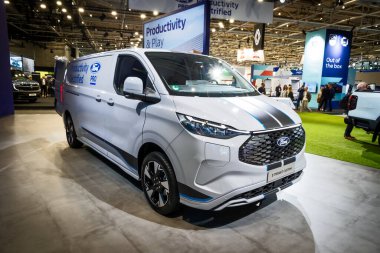 Ford E-Transit Custom electric van at the Hannover IAA Transportation Motor Show. Hannover, Germany - September 16, 2024 clipart