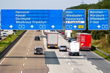 Traffic on German highway. 5 (Bundesautobahn 5). German autobahns have no general speedlimit and rank as the fifth longest highway system. Frankfurt, Germany - Sep 7, 2021. clipart