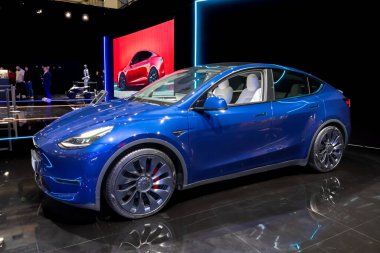 Tesla Model Y car at the Brussels Motor Show. Brussels, Belgium - January 10, 2025. clipart