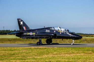 British Royal Air Force BAe Hawk T1 trainer jets taxiing to the runway at Florennes Air Base, Belgium - June 15, 2017 clipart