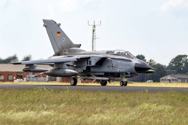 Panavia Tornado bomber jet with HARM AGM-88 missiles from the German Air Force at Schleswig-Jagel Airbase. Germany - June 13, 2019 clipart