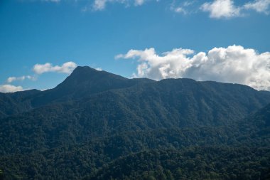 Sunny afternoon. wonderful summer landscape in mountain. Rural scenery. Forest valley view. Smoky Blue Ridge Mountains. Blue sky with clouds over layers of green hills and mountain range