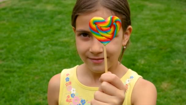 Child Eats Lollipop Candy Selective Focus Kid — Stock Video