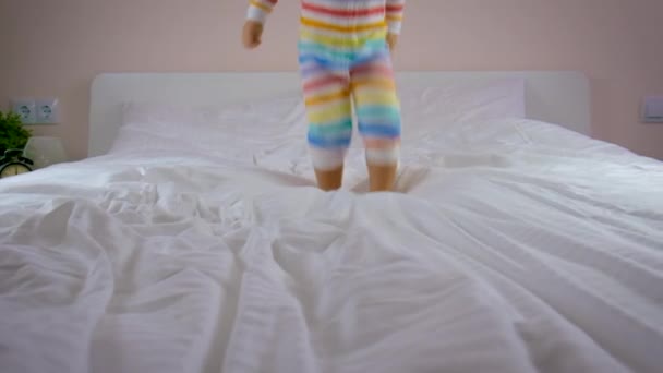 Child Jumping Indulge Pillows Bed Selective Focus Kid — Vídeo de stock