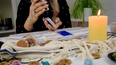 Fortune teller woman reads tarot cards. Selective focus. Magic.