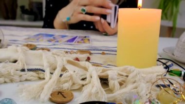 Fortune teller woman reads tarot cards. Selective focus. Magic.