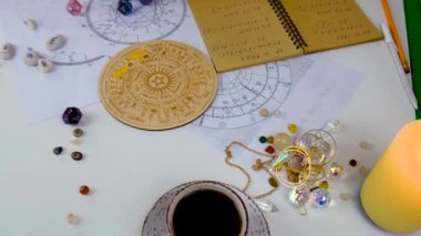 Woman numerologist astrologer counts numbers. Selective focus. People.