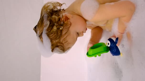Child Bathes Bubble Bath Selective Focus Baby — 图库视频影像