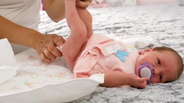 Mom Changes Babys Diaper Selective Focus Kid — Stock Video