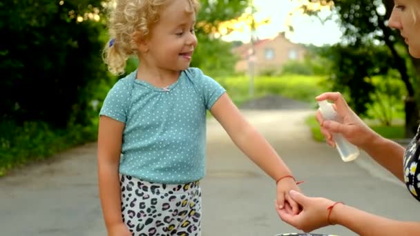 Mother Sprays Child Mosquito Spray Selective Focus Kid — Stock Video