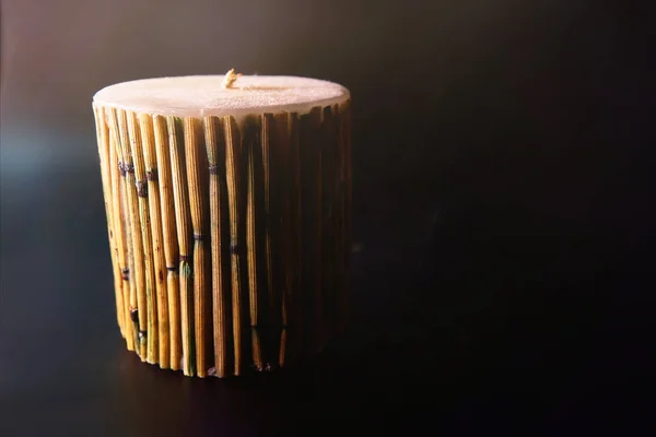 bamboo candle for peace and calm zen mood black back ground