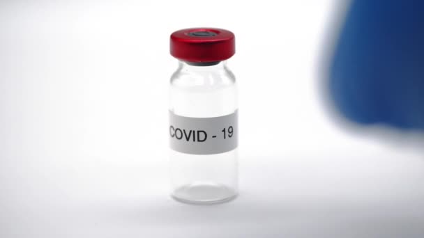 Covid Vile Syringe Pharmaceutical Booster Shot Pandemic Medication White Background — Stock Video