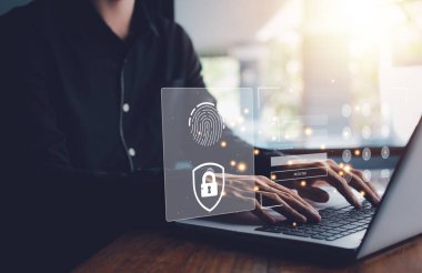 Teknoloji siber güvenlik internet ve ağ sistemi için kullanıcı adı ve parola (Giriş). İşadamı el bilgisayarı daktilo defteri (laptop). Şifreleme, biyometrik tanımlama parmak izi tarayıcısı.