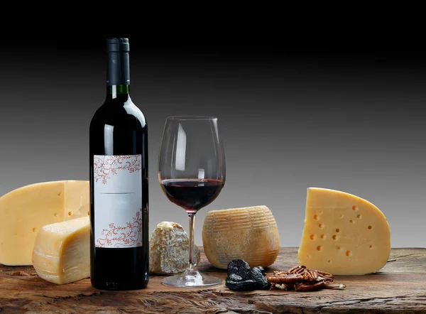 Red wine with cheesered wine with matured gourmet cheese