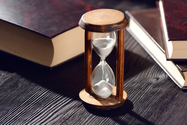 stock image Hourglass as time passing concept for studying deadline, urgency and running out of time copyspace