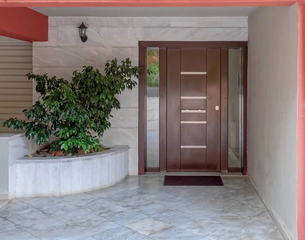 Contemporary Apartment Building Entrance Covered White Marble Potted Plants Dark — Photo