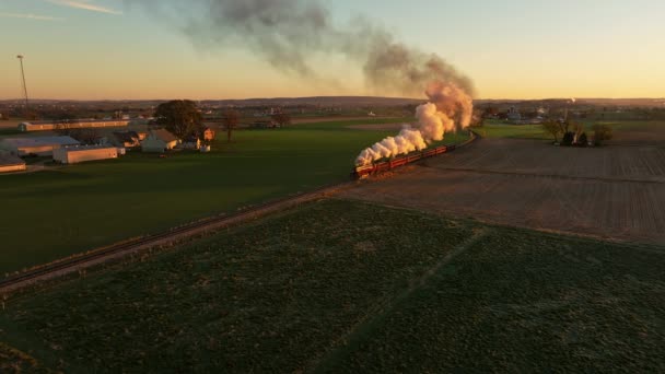 Drone View Steam Engine Approaching Blowing Lots Smoke Sunrise Traveling — Vídeos de Stock