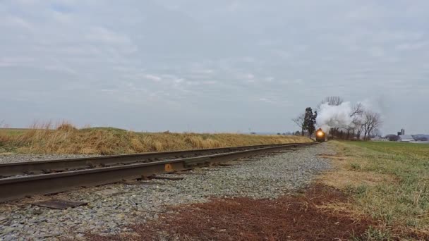 View Antique Steam Passenger Engine Approaching Group Trees Blowing Smoke — Stok video