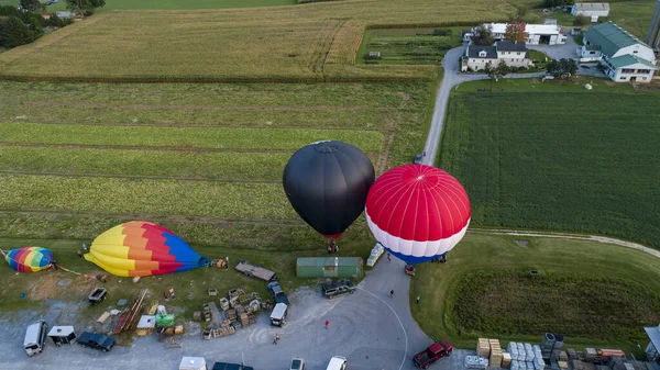 Drone View Multiple Colorful Hot Air Balloons Landing Farms Fields — Fotografia de Stock