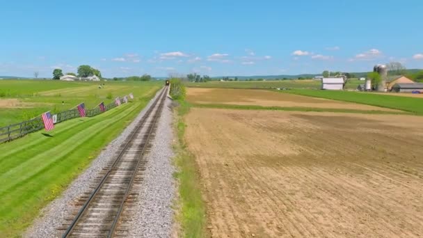 Aerial View Steam Train Approaching Thru Farmlands Fence Many American — Stok Video