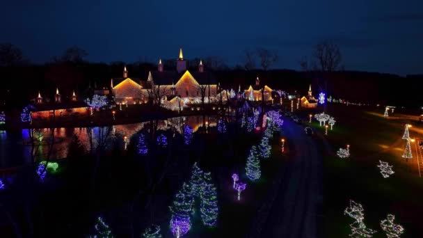 Drone View Large Christmas Display Decorated Building Trees Shrubs Reflecting — Stock Video