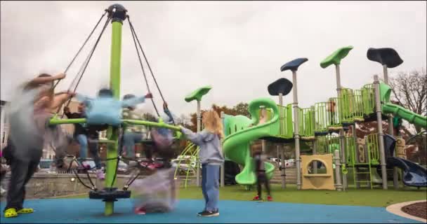 Timelapse Shows Motion Blur Kids Spinning Rapidly Having Fun Playground — 图库视频影像