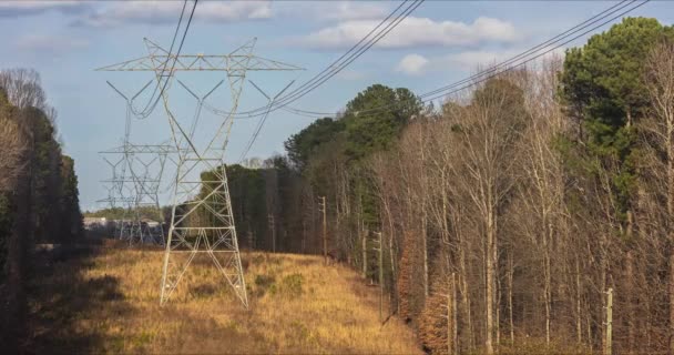 Timelapse Video Clouds Moving Electric Transmission Towers Residential Neighborhood — Stockvideo