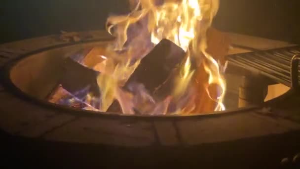 Slow Motion Video Logs Burning Outdoor Home Fire Pit — Stock Video