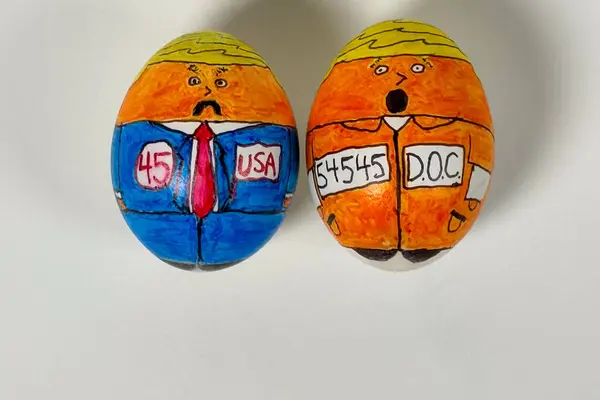 stock image Lawrenceville, GA / USA - June 3, 2024: Cartoonish drawings on eggs show the 45th 