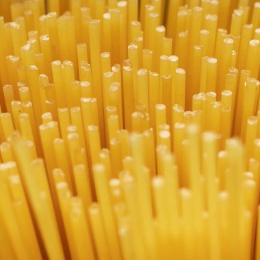 Italian spaghetti pasta. Top view. Defocused abstract photo.