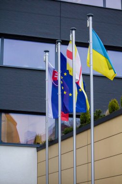 Flags of Ukraine, Slovakia and the European Union on the street
