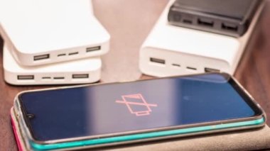 Discharged phone near power banks. Blackout due to war in Ukraine