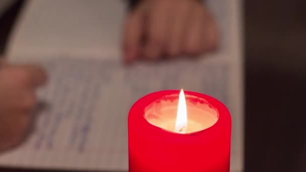 Child Does Homework Candlelight Blackout Due War Ukraine — Stockvideo