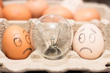 The composition of eggs and a light bulb shows the rise in the price of food , eggs and electricity in Europe due to the war in Ukraine