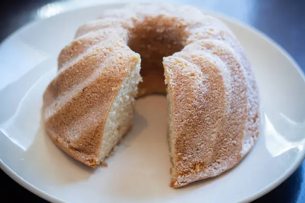 stock image Bundt cake on a white plate.