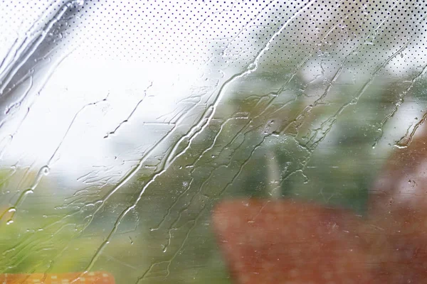 Wet window glass after rain
