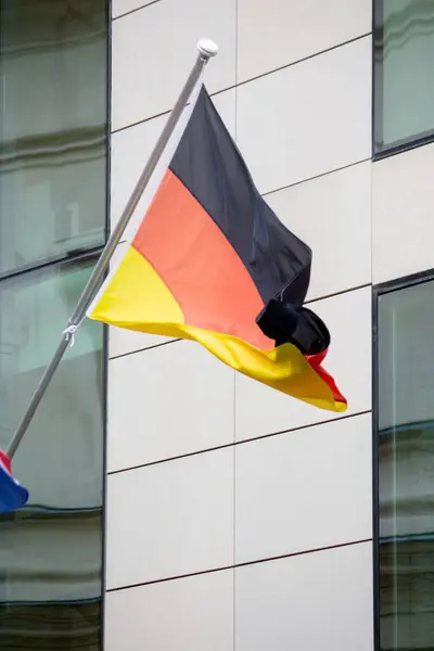 Germany flag on the background of a modern building