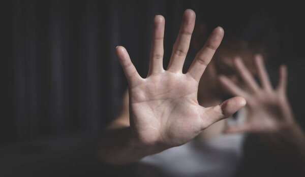 The concept of stopping acts of violence against women. Stop violence against and sexual abuse women, anti trafficking , International Women's Day.