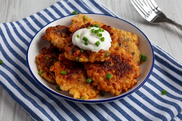 stock image Homemade Fried Cheddar Corn Fritters on a Plate, side view.