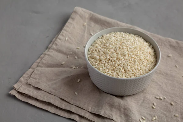 Raw Organic Carnaroli Rice Bowl Gray Surface Side View Copy — Stock Photo, Image