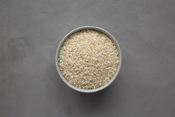 Raw Organic Carnaroli Rice Bowl Gray Background Top View Overhead — Stock Photo, Image