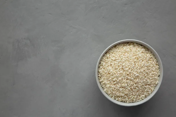 Raw Organic Carnaroli Rice Bowl Gray Background Top View Overhead — Stock Photo, Image