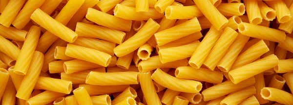 Dry Rigatoni Pasta Background Top View — 스톡 사진